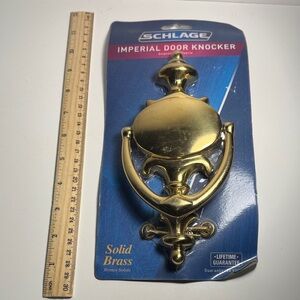 NEW!  Schlage Imperial Solid Brass Door Knocker - Polished Brass